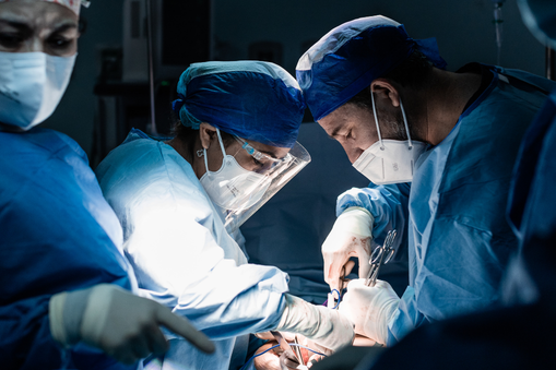 Surgeons performing a surgery
