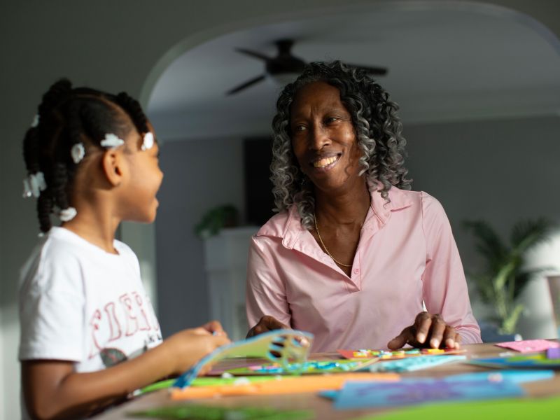 Marcella and child playing