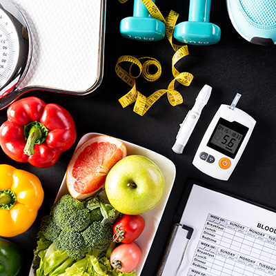 Fruits, vegetables, weights, glucose test, measuring tape