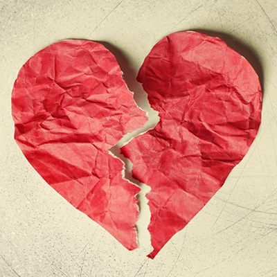 Red paper heart ripped and crinkled