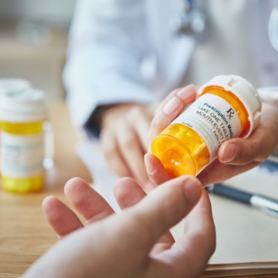 Doctor give someone a prescription