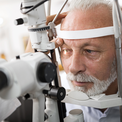 older male getting eyes checked