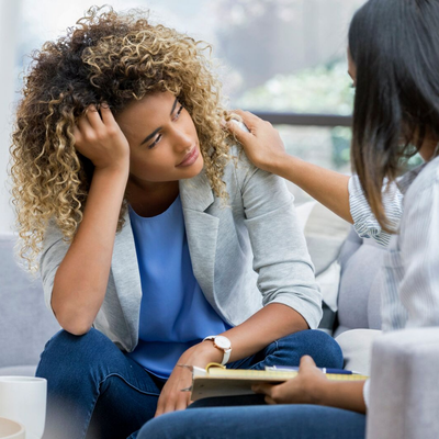 woman with depression speaking with doctor