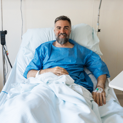 Looking comfortable in hospital bed