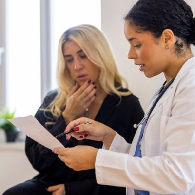A doctor explaining test results to a patient