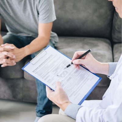 A man talking with his doctor