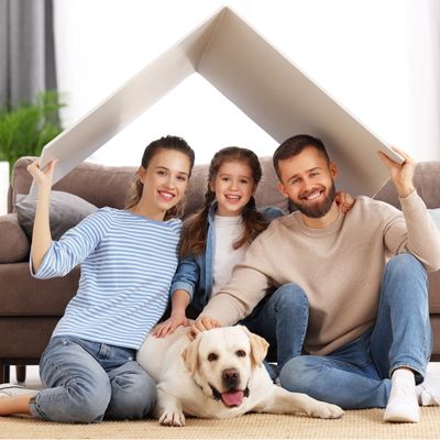 family looking at the camera smiling