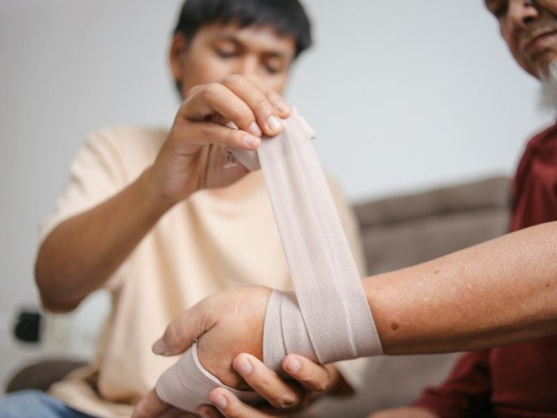 Wrapping bandage around wrist