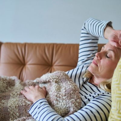 Woman laying on couch