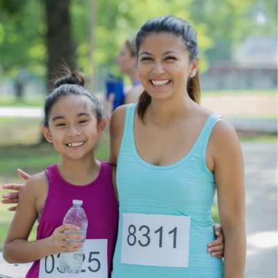 Mom and daughter preparing to run marathon
