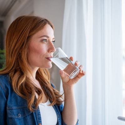 Woman drinking a glass of water