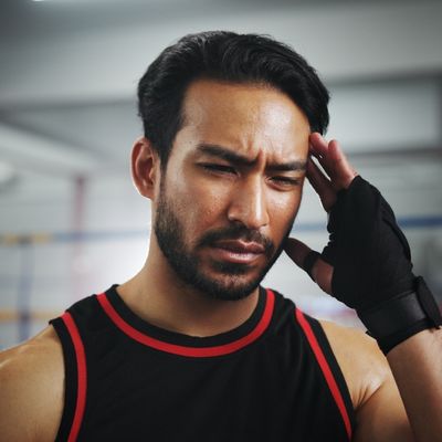 Man holding head in pain