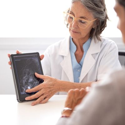 Doctor reviewing mammogram with patient