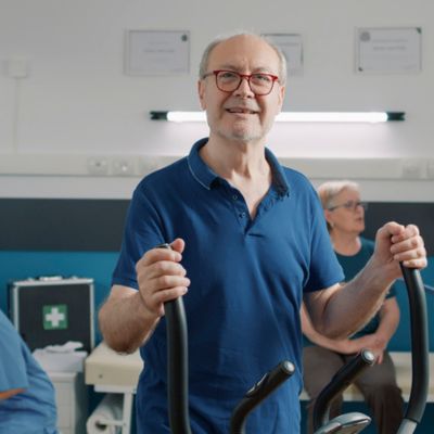 Older man on the elliptical