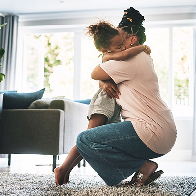 Mother hugging her child