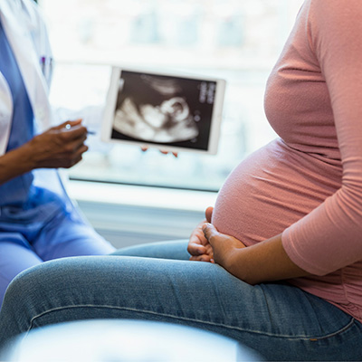 pregnant woman at doctors office