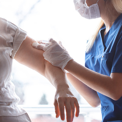 Person receiving a flu vaccine 