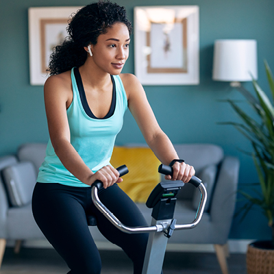African American Woman on an exercise bike