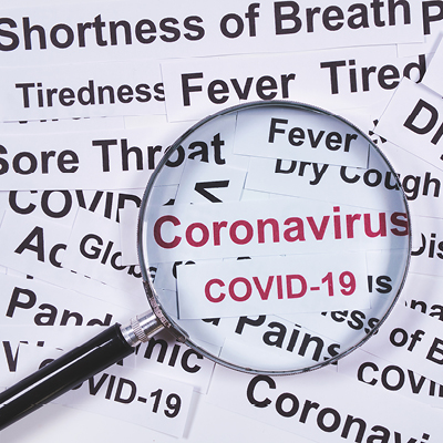 magnifying glass over "Coronavirus and COVID-19"