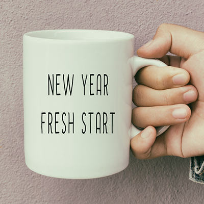 Coffee mug with "New Year Fresh Start" written on it