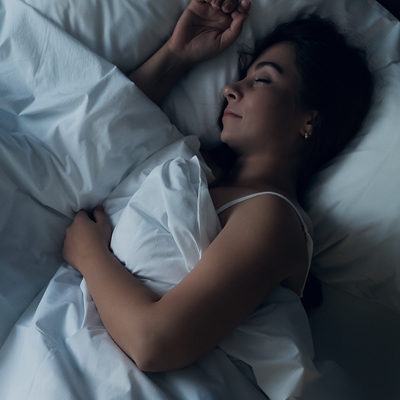 Woman sleeping in bed