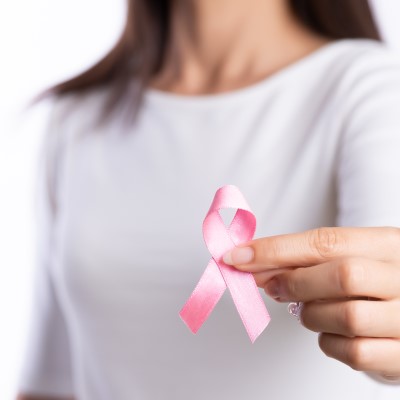 Women holding pink ribbon