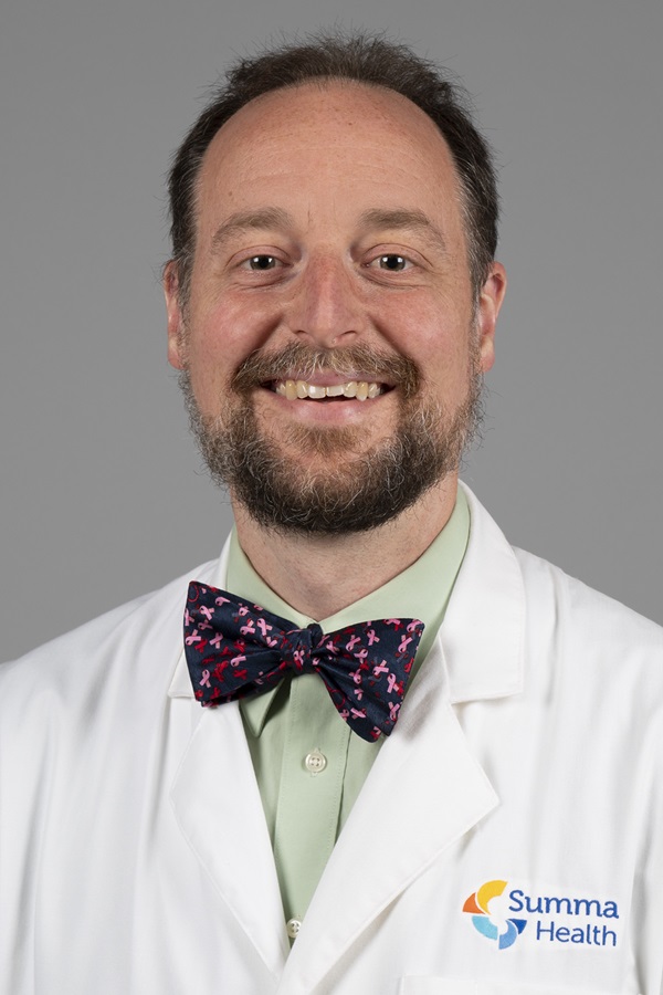 Doctor in white lab coat and a bowtie