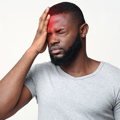 Man holding head in pain