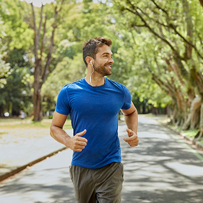 Tapering Man running in street