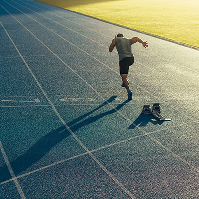 man running on track