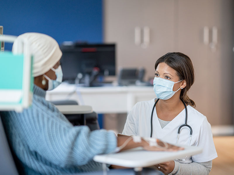 Cancer patient speaking with doctor about surgical options