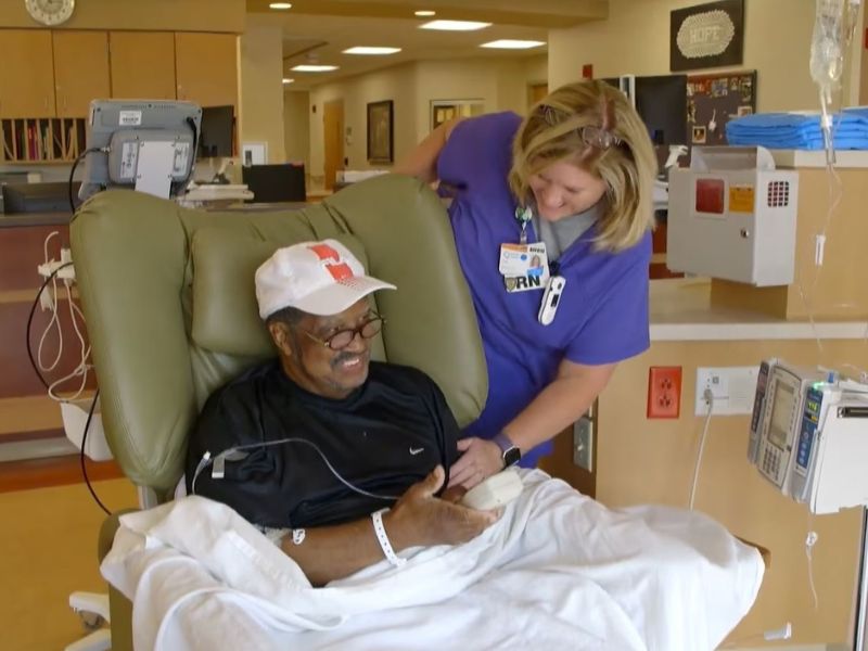 summa nurse helping cancer patient 