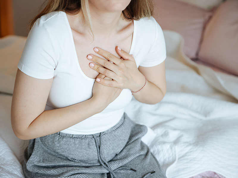 woman holding heart