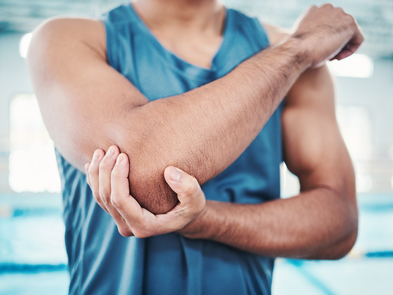 athlete with elbow pain