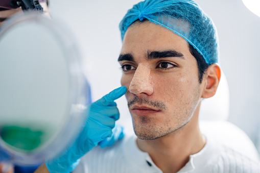 A patient being examined for cosmetic surgery