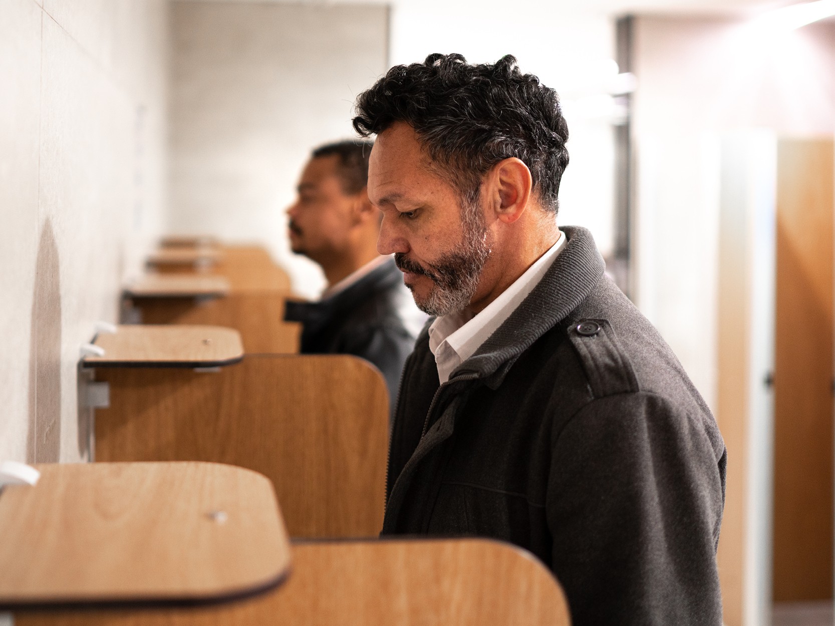 Male Incontinence CTA - Man at Urinal