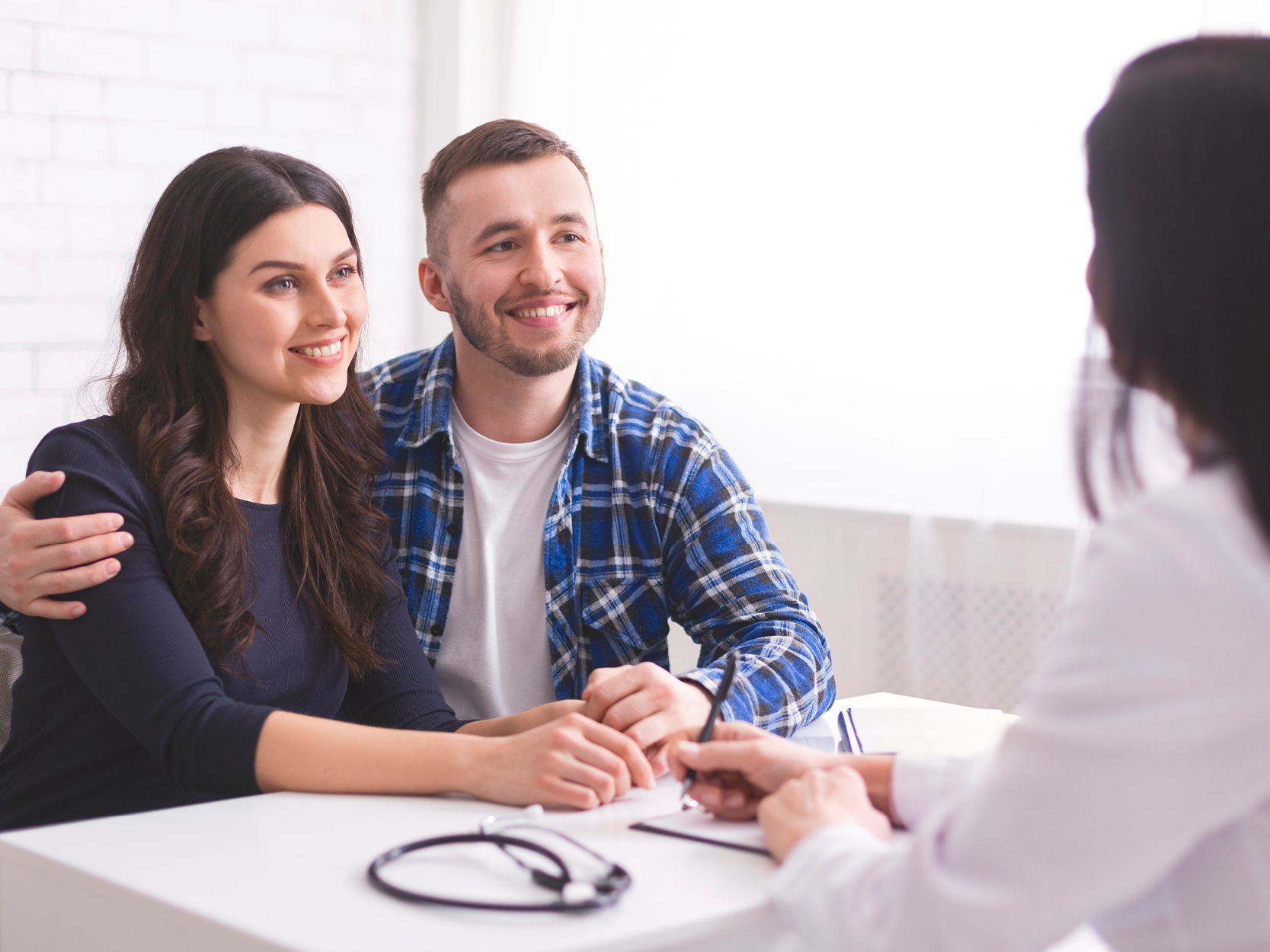 Male Fertility CTA - Couple at doctor's office
