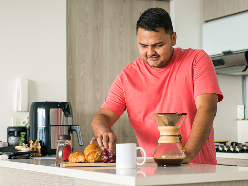 man preparing coffee