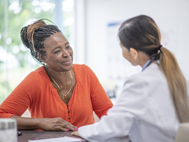 Black female patient with doctor
