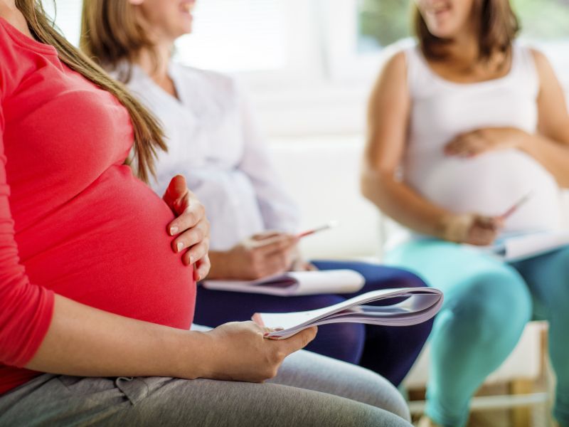 Pregnant women in a group
