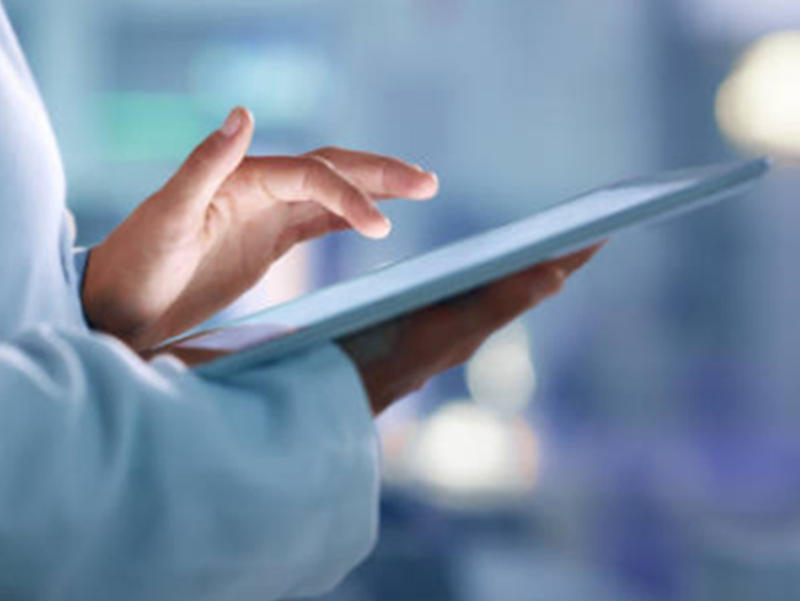 researcher using tablet