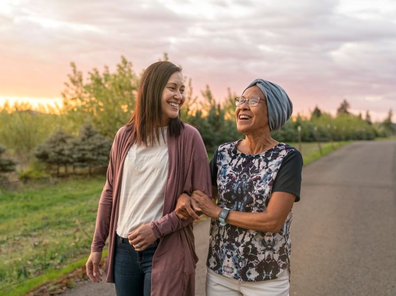 Mother and daughter walking