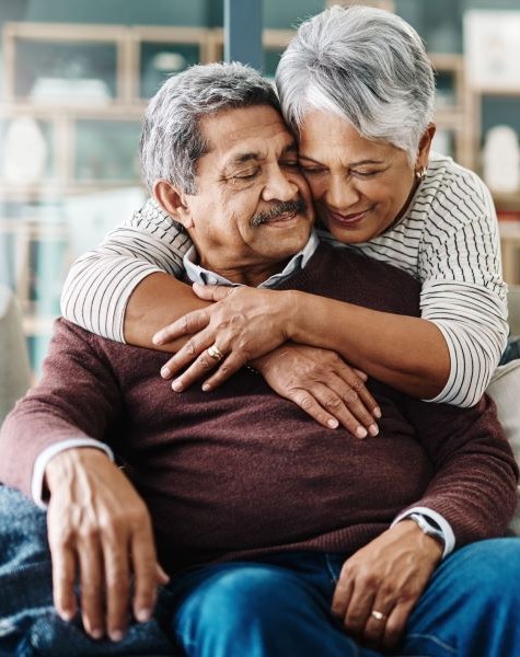 Couple holding each other in a loving way