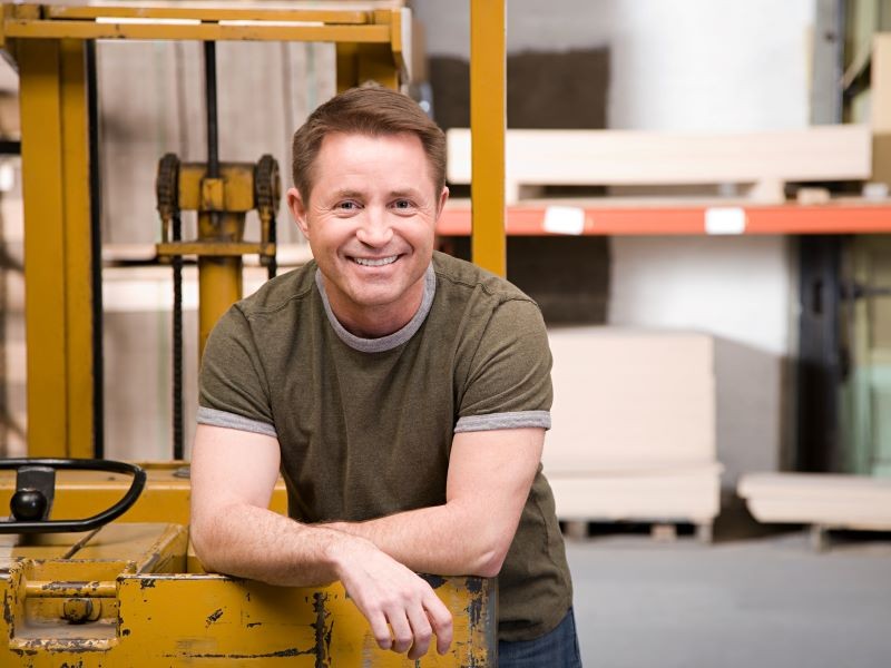 Man smiling on machine